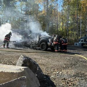 Smoke turns from black to white as the flames extinguish from a vehicle fire in Thomaston, Monday, Sept. 29, 2025. (Photo by Katie Maynard) White smoke drifts away from the remains of a pickup truck that caught fire. (Photo by Katie Maynard)