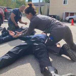 Practicing the MARCH physical assessment: massive hemorrhage, airway control, respiratory support, circulation, hypothermia and head injury.  (Photo courtesy Matt Heath/Camden Fire Dept.)