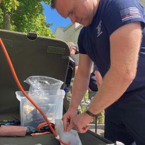 Packing wounds. (Photo courtesy Matt Heath/Camden Fire Dept.)