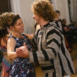 Dance partners dance to music