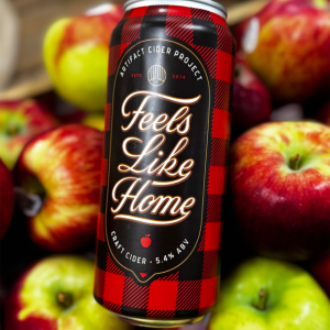 Can of cider and a bushel of apples