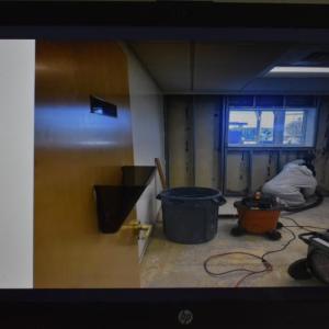 View of a gutted office during a remediation attempt.