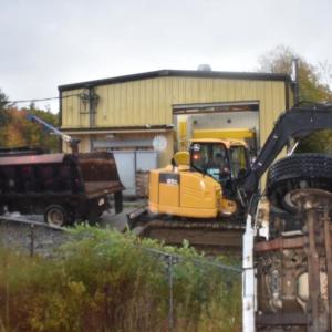Construction vehicles working the scene
