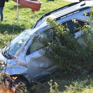 Damage to the vehicle includes a dented-in roof