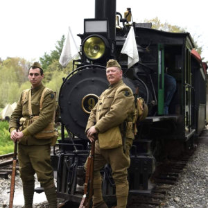 World War I reenactors in front of a train