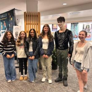 (Photo courtesy Julie Fajardo) Six attendees pose for a picture in a lobby