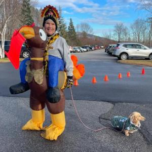 A Y employee wearing a turkey costume