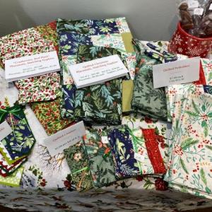 Folded decorative linen on a display table