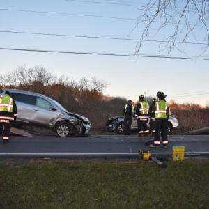 Each vehicle being pulled on to wreckers simultaneously