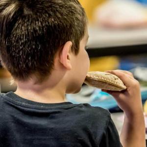 Lisbon Community School cafeteria separate their leftover food scraps — which can be used for composting or animal feeds — from trash and unused items to help reduce food waste in 2023. Photo by Kathy Rice. 