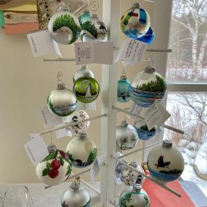 Christmas ornament balls on a bare tree