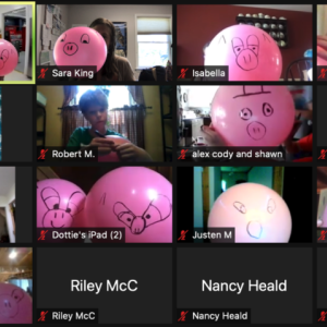 Zoom session with balloon pig faces