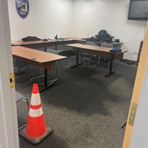 safety cone marks a water-soaked carpet