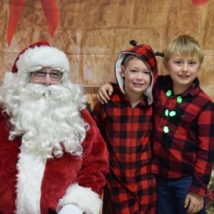 Santa and two boys