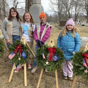 Four females in a cemetery