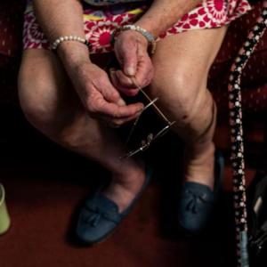 a woman sitting in a chair