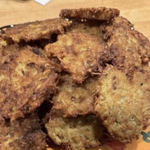 A platter of latkes, awaiting sour cream and homemade applesauce. (Photo by Ed O’Brien)