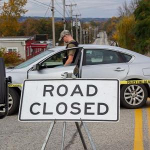 Law enforcement blocks a road