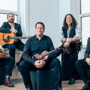 Band sitting with instruments