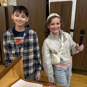 Boy and girl with microphone