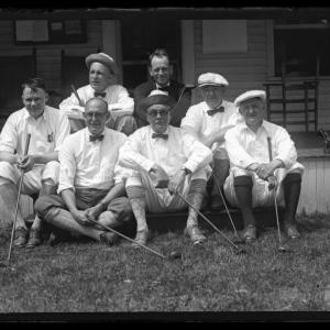 Black and white photo of a group of golfers
