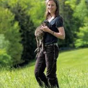 Woman holding a lamb