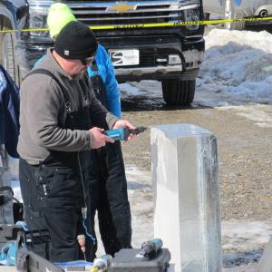 Carvers worked with hand and electrical tools. Photo by Kay Stephens