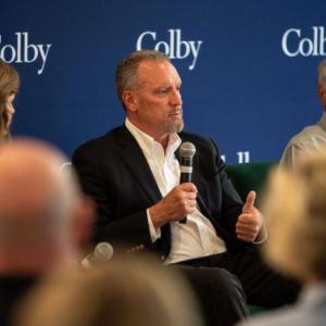 steven michaud speaks during a panel event