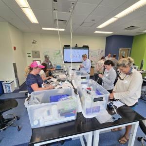 Teachers assembling take-home equipment kits. Courtesy of Bigelow Laboratory