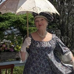 woman, grayish dress, parasol