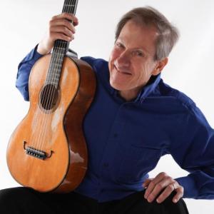 David Rogers holding guitar