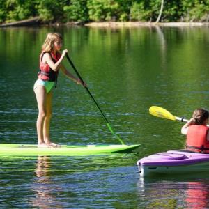 girls paddle board, kayak
