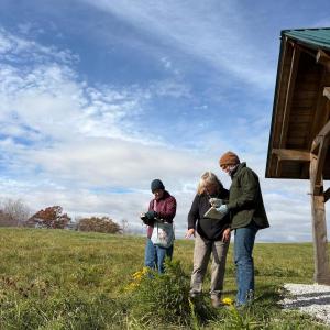 standing with notebooks