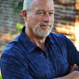 John David Adams wearing blue shirt