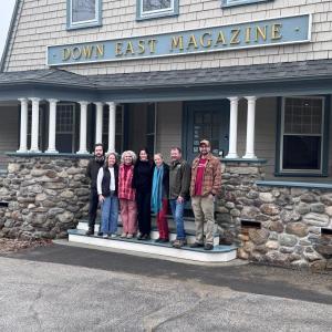 staff under Down East Magazine porch sign