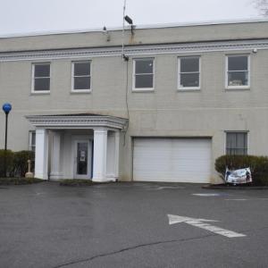 Police station building entrance, no vehicles