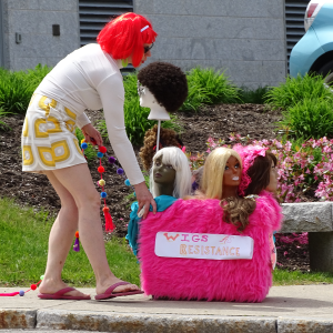 Bridget Matros moves her mini float into position. (photo by Erica Thoms)