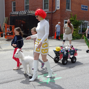 Bridget Matros, parade organizer, leads the procession. (photo by Erica Thoms)