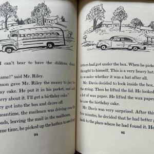A few pages from Here Comes the Bus with illustrations of Bud Wood's bus by author Carolyn Haywood.