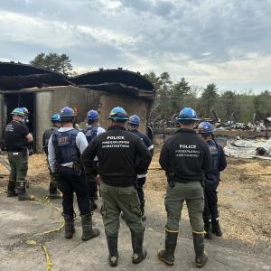 specialized investigators at fire scene