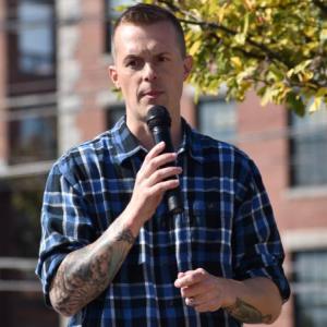 jared golden speaks during an event