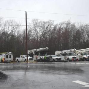 power trucks staging in a parking lot.