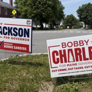campaign signs for Troy Jackson and Bobby Charles.