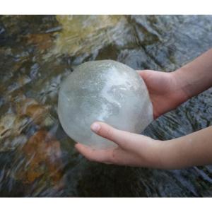 orb held above water