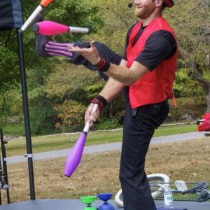man and juggling act