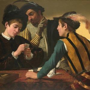 three males at a card game