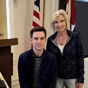 man at piano, woman standing