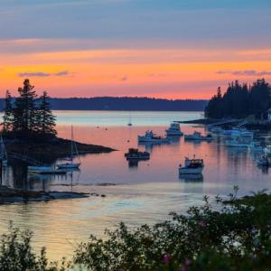 sunset over a harbor