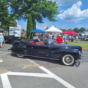 OHTM black sedan