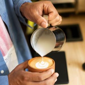 Pouring a flat white. Photo courtesy Marcel Pardoa
